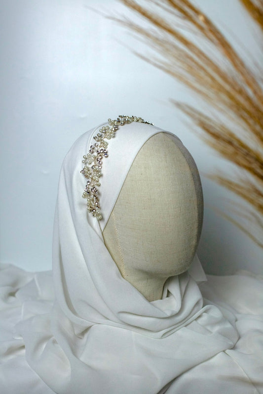 Bijoux de tête avec une combinaison de perles et strass